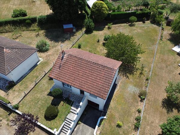 Maison sur sous-sol proche commerces