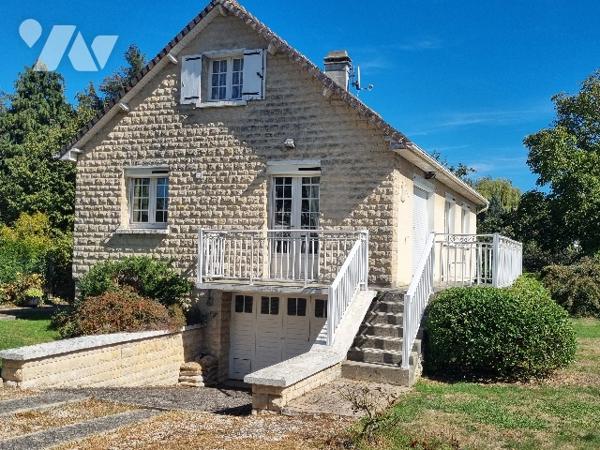 Maison de Bourg de 5 PP avec jardin.