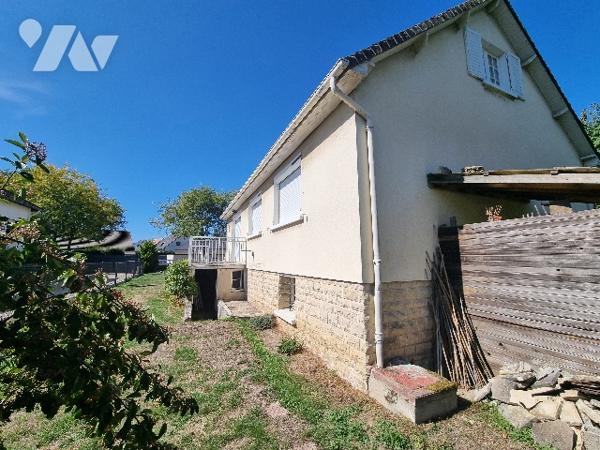 Maison de Bourg de 5 PP avec jardin.