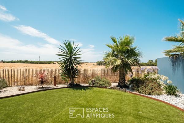 Familiale aux volumes généreux et sa piscine intérieure
