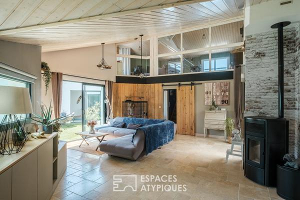 Familiale aux volumes généreux et sa piscine intérieure