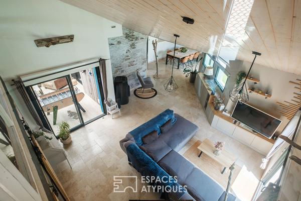 Familiale aux volumes généreux et sa piscine intérieure