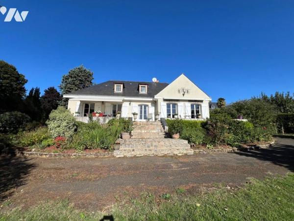 Au THOUREIL Maison avec vie de plain-pied dans parc paysager 