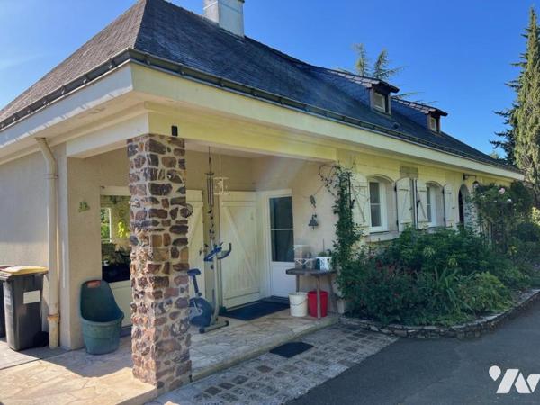 Au THOUREIL Maison avec vie de plain-pied dans parc paysager 