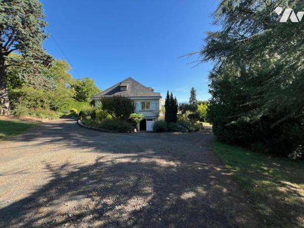 Au THOUREIL Maison avec vie de plain-pied dans parc paysager 