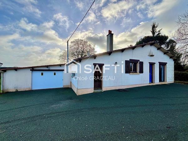 Maison de plain-pied, 89 m² habitables, garage