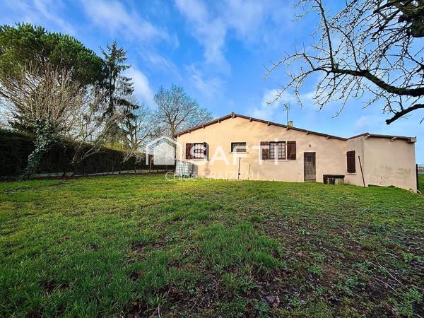 Maison de plain-pied, 89 m² habitables, garage