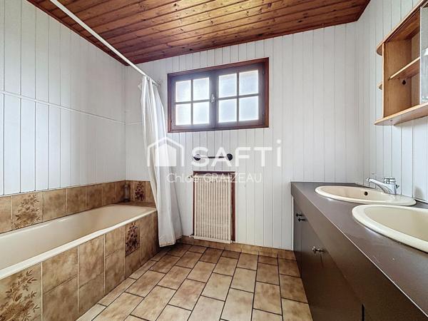 Maison de plain-pied, 89 m² habitables, garage