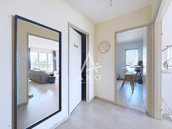 UN APPARTEMENT LUMINEUX, FONCTIONNEL ET SOIGNEUSEMENT AGENCÉ AVEC GARAGE