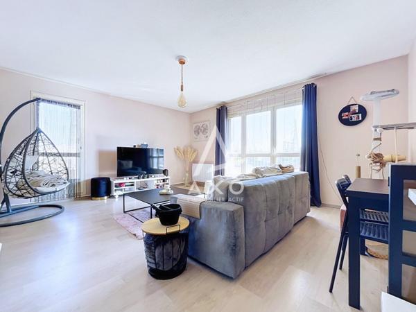 UN APPARTEMENT LUMINEUX, FONCTIONNEL ET SOIGNEUSEMENT AGENCÉ AVEC GARAGE