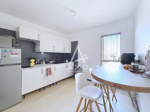 UN APPARTEMENT LUMINEUX, FONCTIONNEL ET SOIGNEUSEMENT AGENCÉ AVEC GARAGE