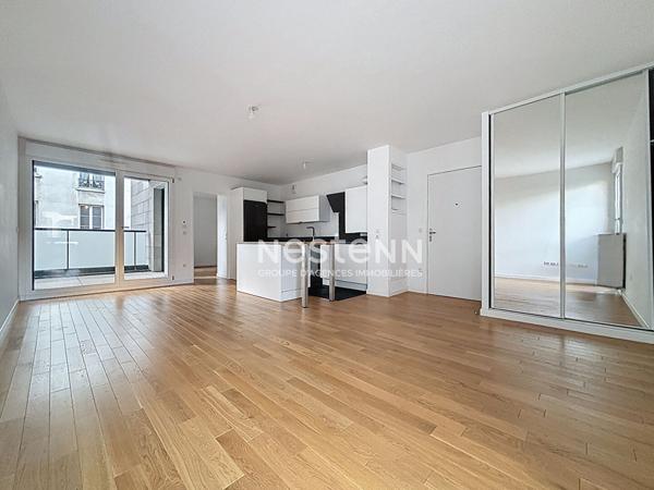 ISSY LES MOULINEAUX - AVENUE VICTOR CRESSON - Vente d'un appartement 3 pièces traversant avec balcon immeuble standing