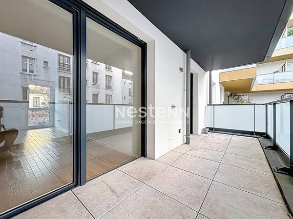 ISSY LES MOULINEAUX - AVENUE VICTOR CRESSON - Vente d'un appartement 3 pièces traversant avec balcon immeuble standing