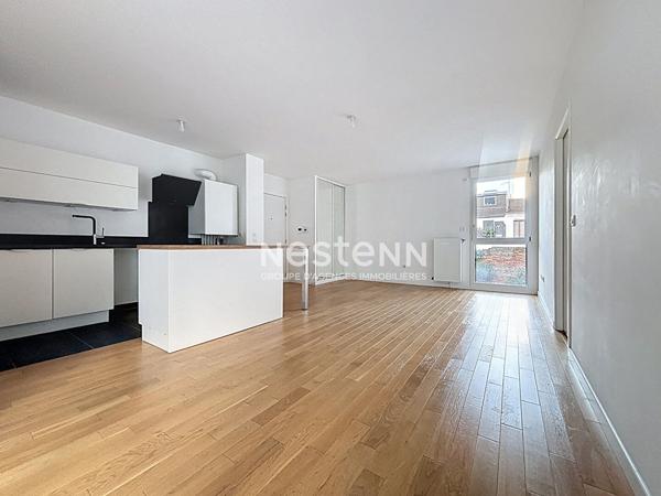 ISSY LES MOULINEAUX - AVENUE VICTOR CRESSON - Vente d'un appartement 3 pièces traversant avec balcon immeuble standing