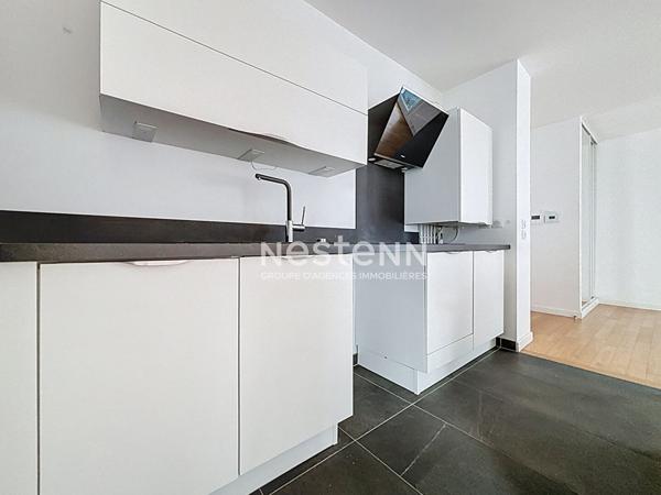ISSY LES MOULINEAUX - AVENUE VICTOR CRESSON - Vente d'un appartement 3 pièces traversant avec balcon immeuble standing