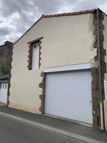 Maison de bourg 75 M2 avec garage et jardin