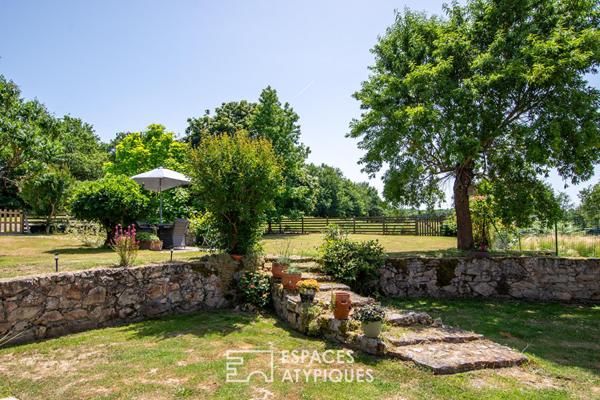 Propriété en pierre dans un écrin de verdure