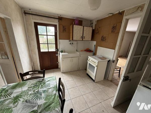 Maison en centre bourg avec beau jardin et logement annexe