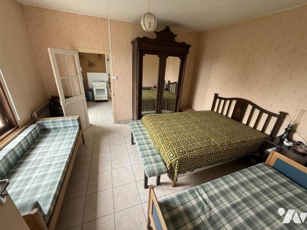 Maison en centre bourg avec beau jardin et logement annexe