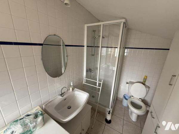 Maison en centre bourg avec beau jardin et logement annexe