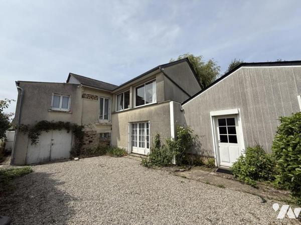 Maison en centre bourg avec beau jardin et logement annexe