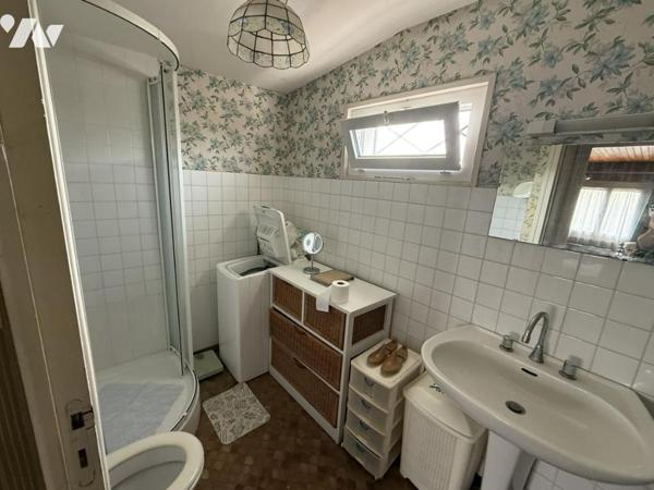 Maison en centre bourg avec beau jardin et logement annexe