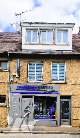 Ensemble immobilier à usage mixte commerce / habitation