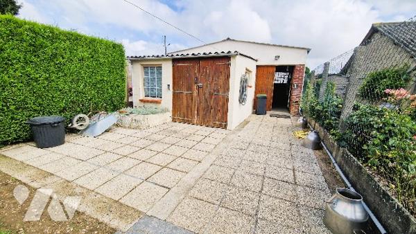 Ensemble immobilier à usage mixte commerce / habitation