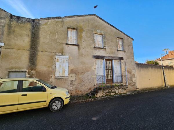 Maison 200 m² centre bourg d'Escurolles