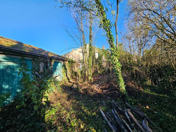 Maison 200 m² centre bourg d'Escurolles