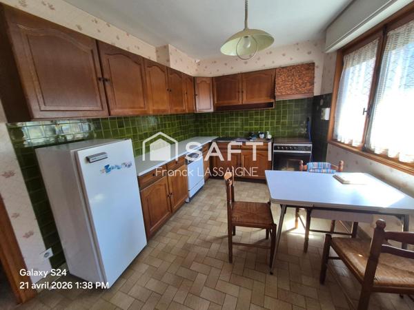 Maison centre ville avec balcon et garage