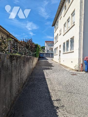 APPARTEMENT EN DUPLE X 2 CHAMBRES   CAVE GARAGE