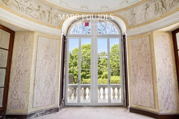 T4 dans le Château de Grand Champ- avec terrasse privative, cave et parkings