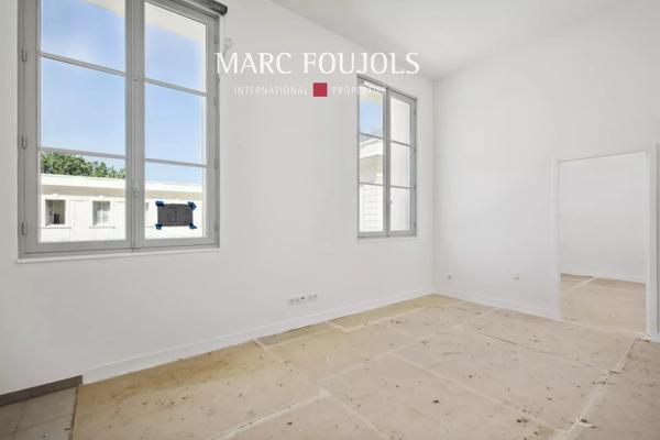 T4 dans le Château de Grand Champ- avec terrasse privative, cave et parkings