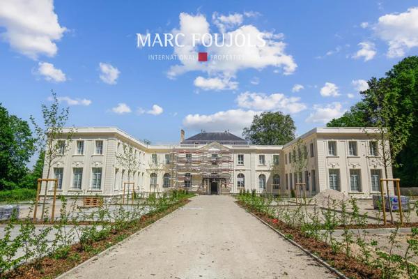 T4 dans le Château de Grand Champ- avec terrasse privative, cave et parkings