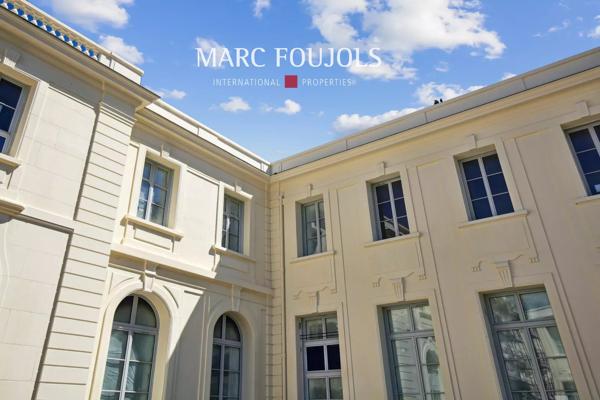 T4 dans le Château de Grand Champ- avec terrasse privative, cave et parkings