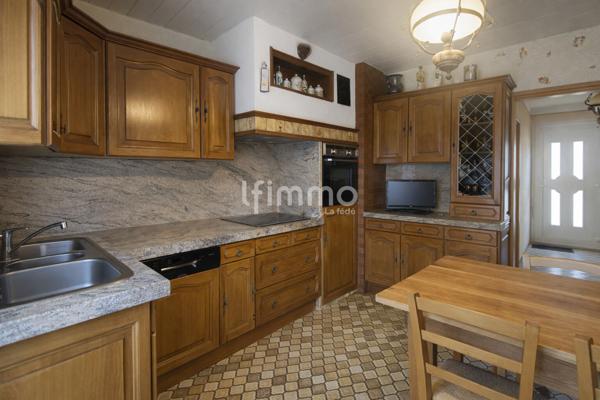 Maison plain-pied surélevé dans secteur calme