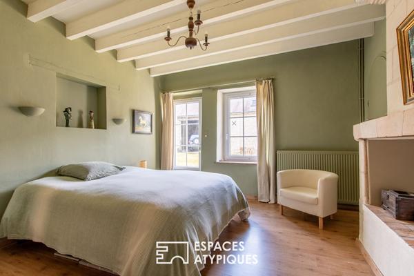 Belle Propriété au cadre champêtre avec prairie et boxes pour chevaux