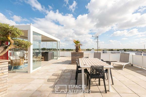 Prendre de la hauteur : appartement contemporain et son rooftop suspendu
