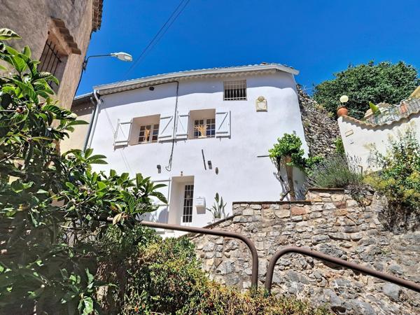 Maison de village avec jardin et cabanon
