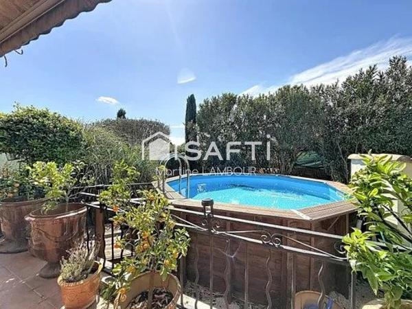 Maison T4 de plain-pied avec jardin terrasse et bassin