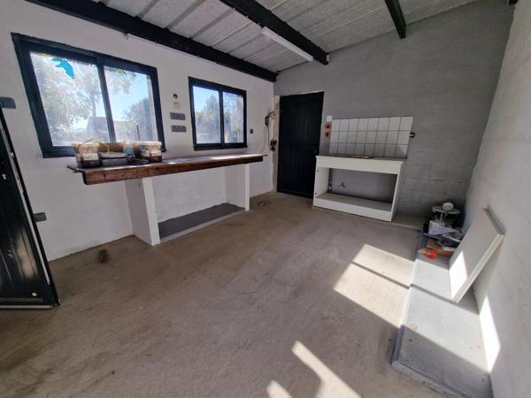 Terrain à vendre proche de NANCY (54) TERRAIN CLOS de murs de 1072 m2 avec ATELIER et TERRASSE COUVERTE