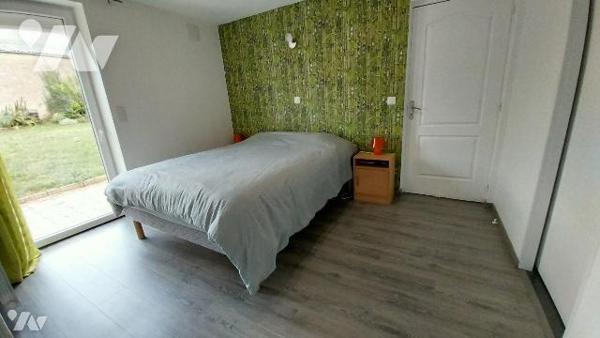 Un ensemble immobilier, composé de deux logements, à usage de gîte rural.