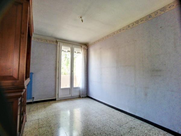 T3/4 avec balcon et place de parking