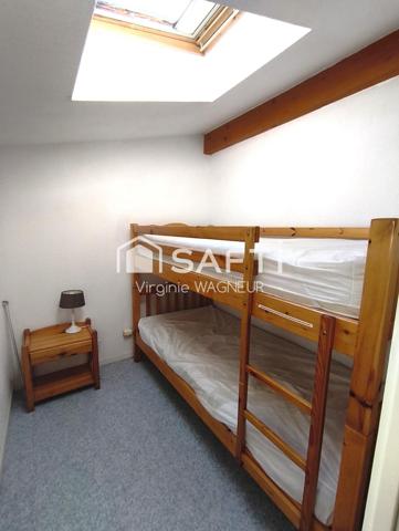 Duplex climatisé en excellent état au dernier étage