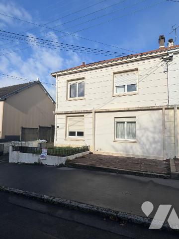 Immeuble de rapport composé de 4 logements et un garage