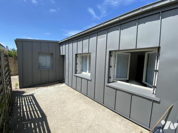 Immeuble de rapport composé de 4 logements et un garage