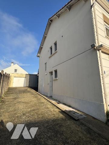 Immeuble de rapport composé de 4 logements et un garage