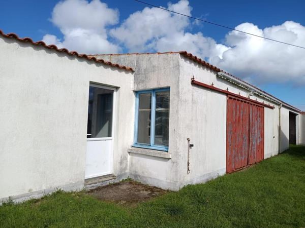 Maison et Hangar 674m2