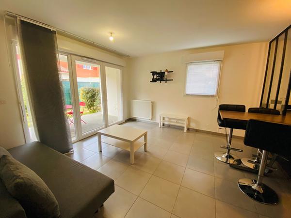 Appartement T3  avec jardinet, cellier et parkings